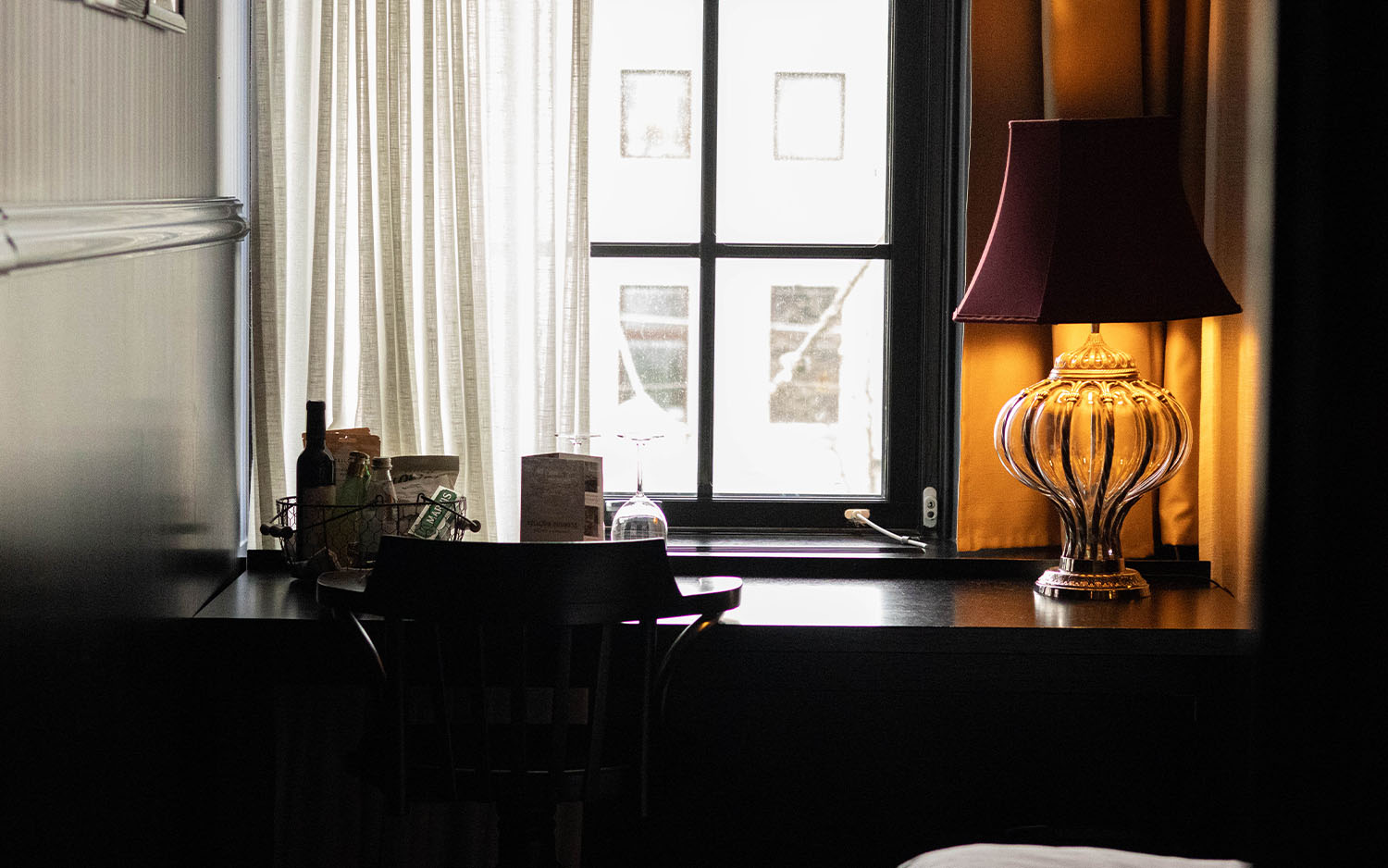 Bellora hotel room workspace with desk and natural light
