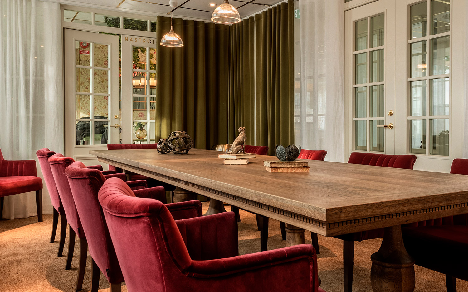 Bellora boardroom with presentation screen and AV equipment