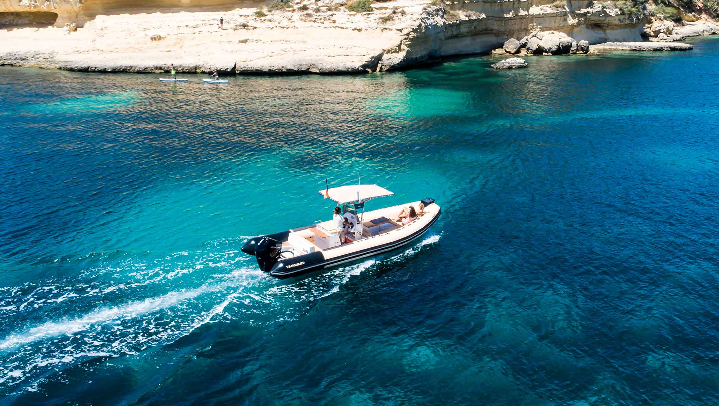 High-speed RIB tender boat speeding through Palma waters