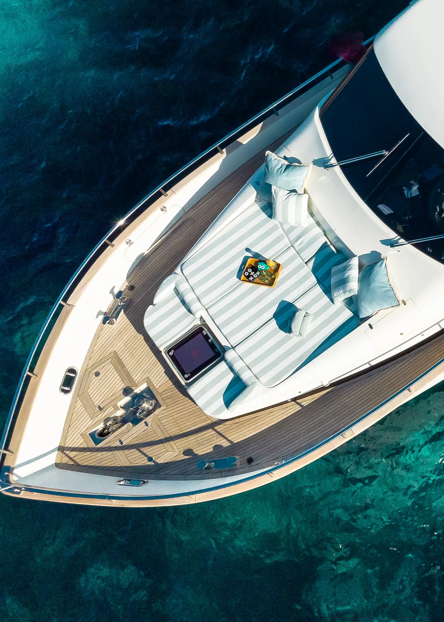 Spacious sun deck with lounging area aboard ESSOESS yacht