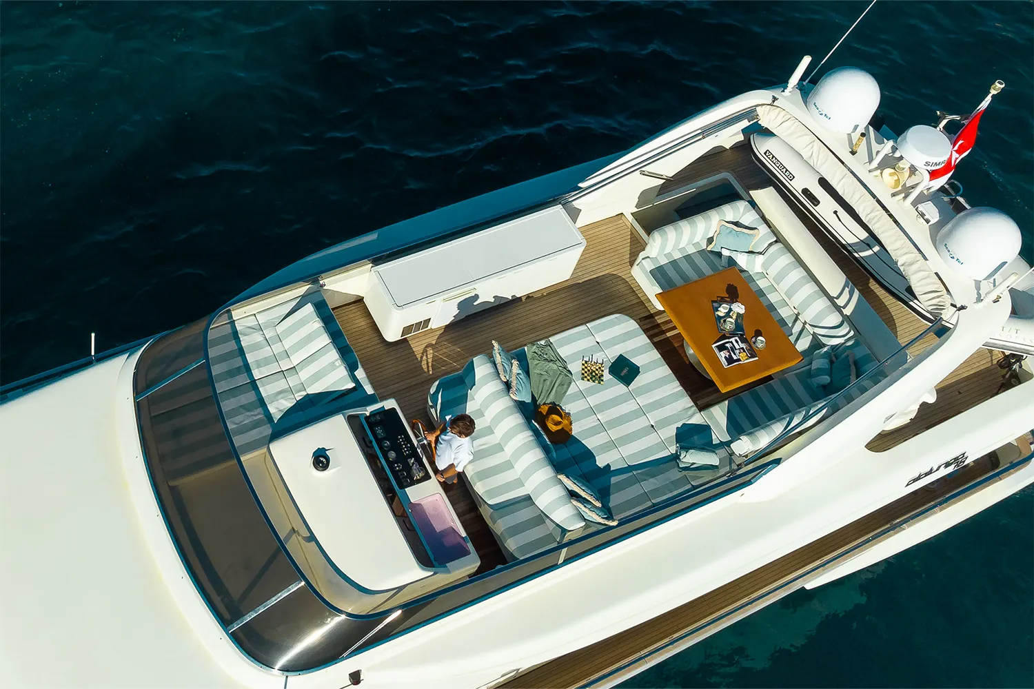 Dining area set for guests aboard ESSOESS luxury yacht