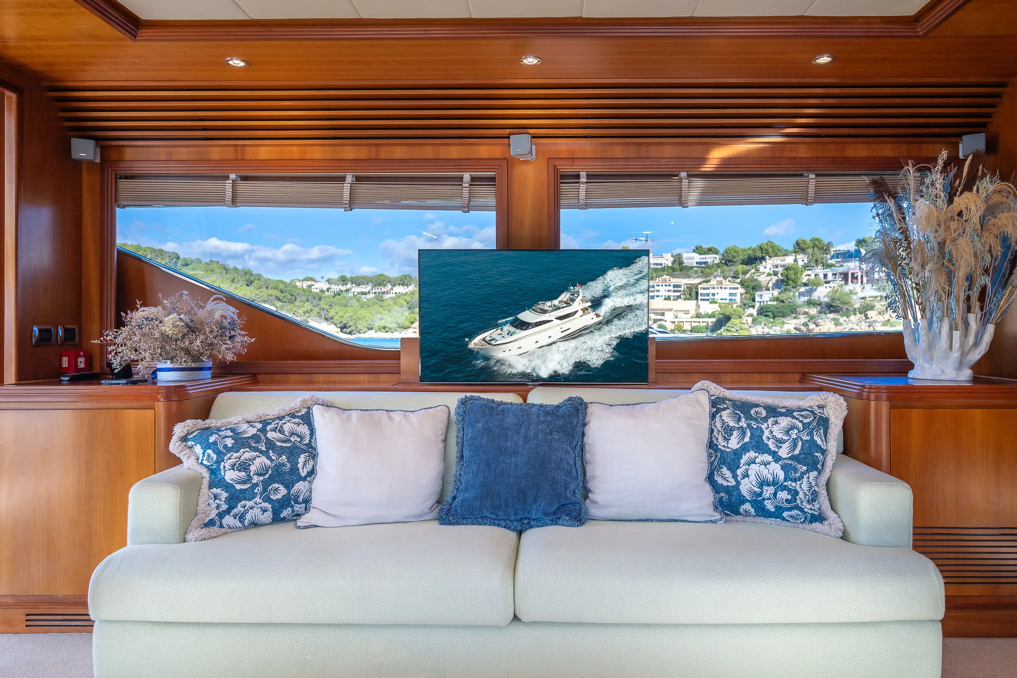 Aerial view of ESSOESS yacht navigating turquoise waters