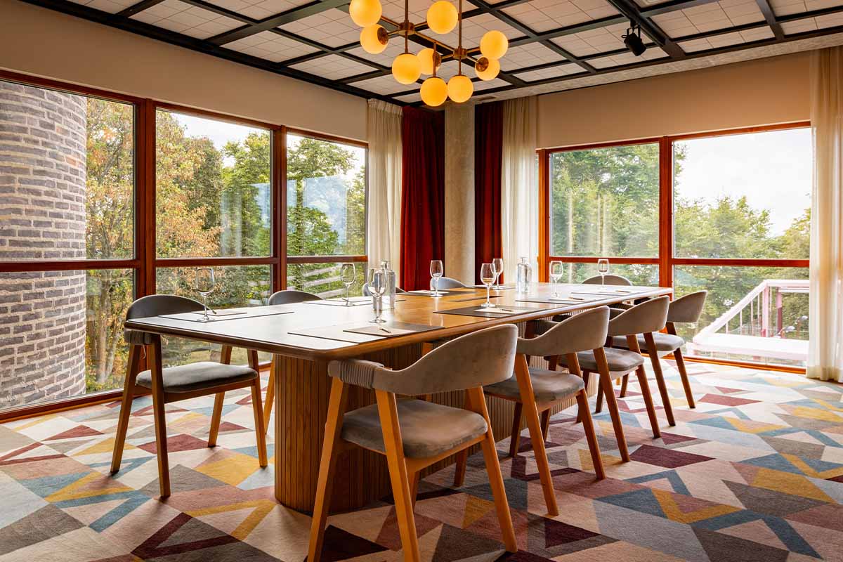 Conference room setup at Ellery Beach House Stockholm with presentation screen