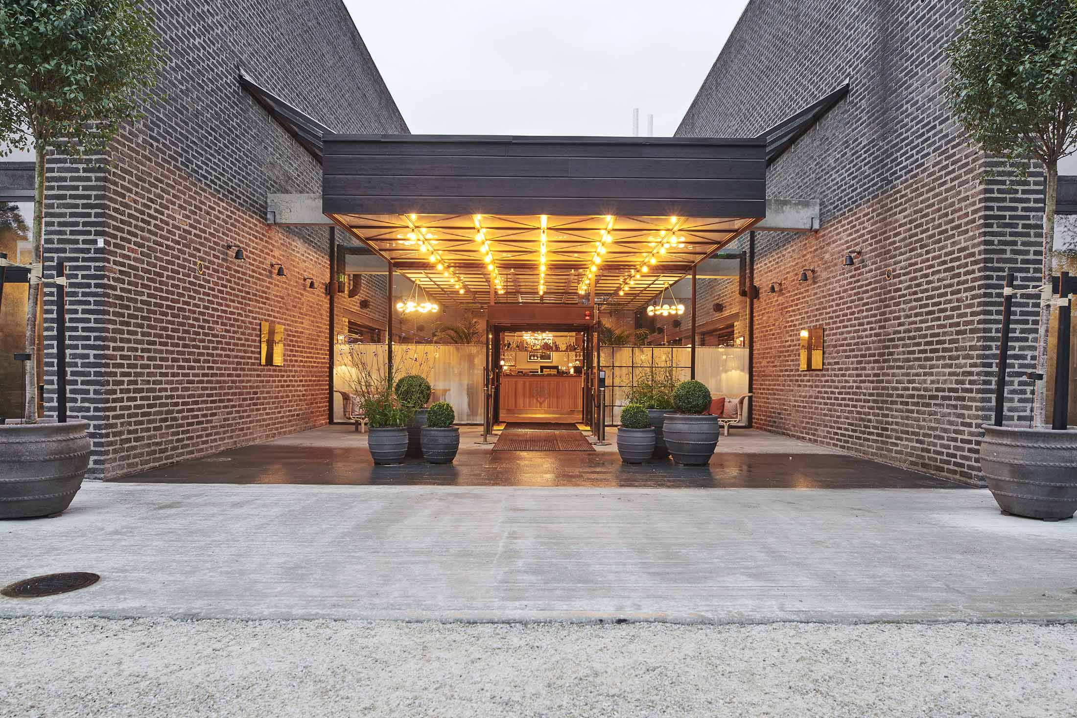 Ellery Beach House sunset view over the water from the resort terrace