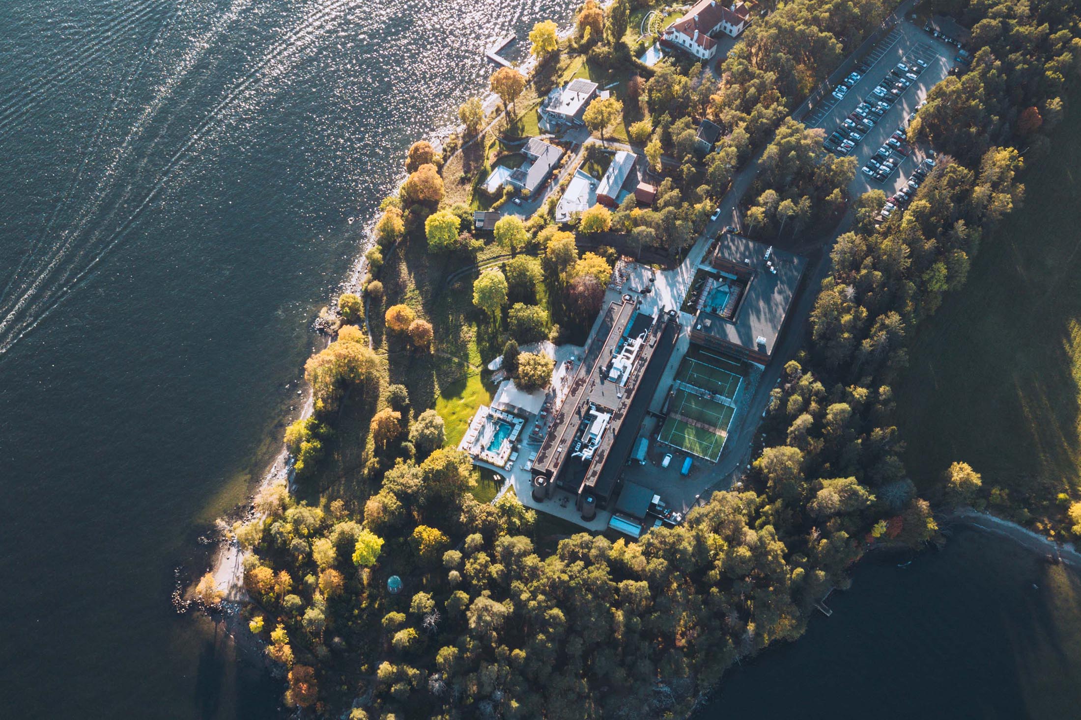 Ellery Beach House winter evening with ambient lighting along the waterfront