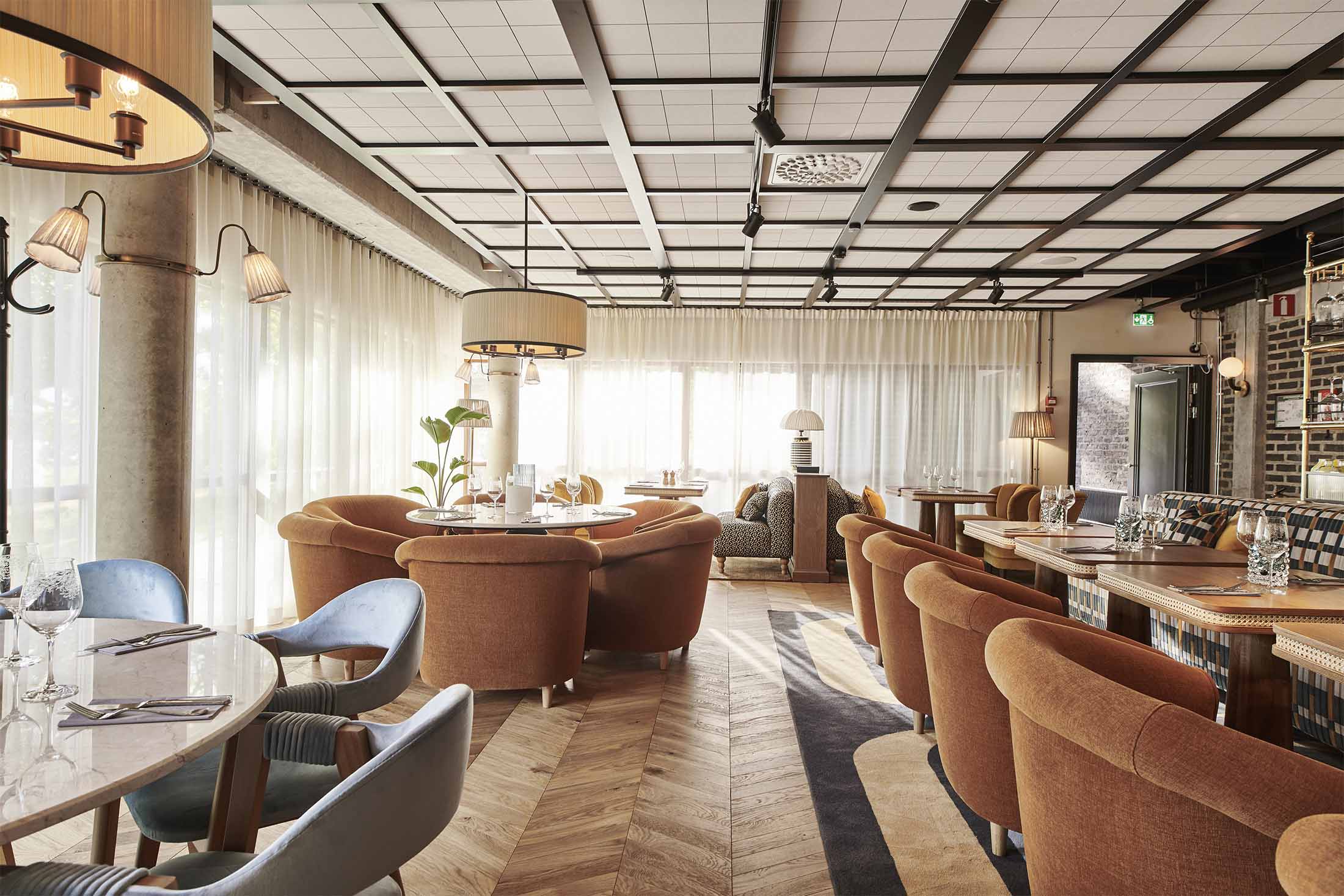 Ellery Beach House courtyard with string lights and evening ambiance