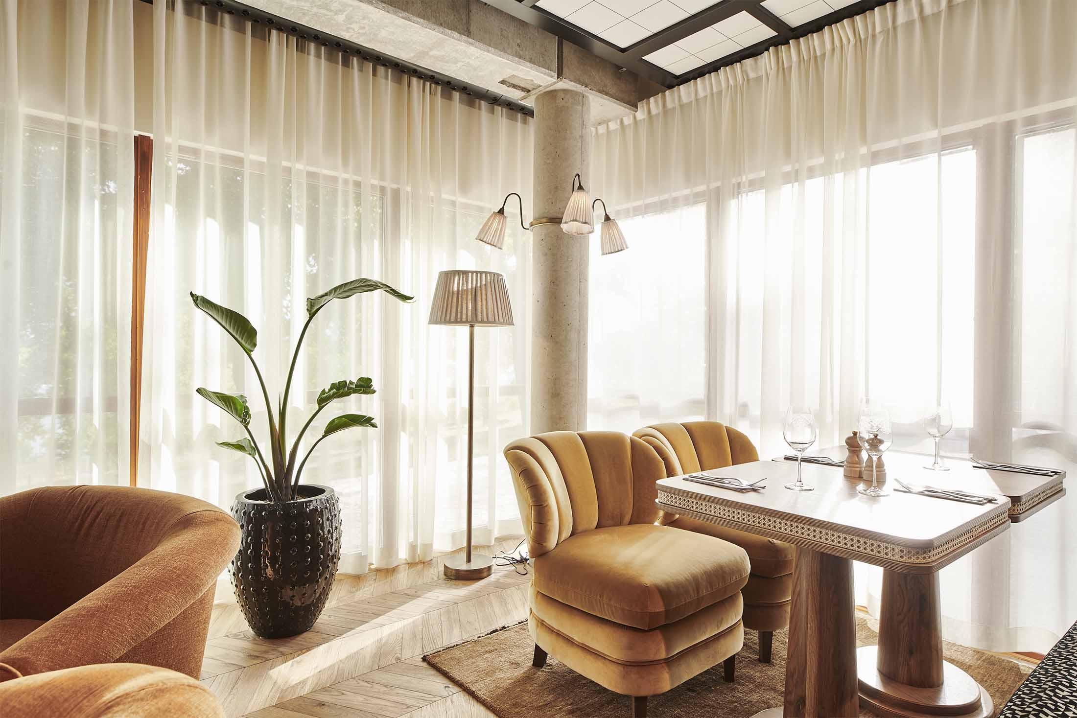 Ellery Beach House jetty and shoreline at golden hour in Stockholm