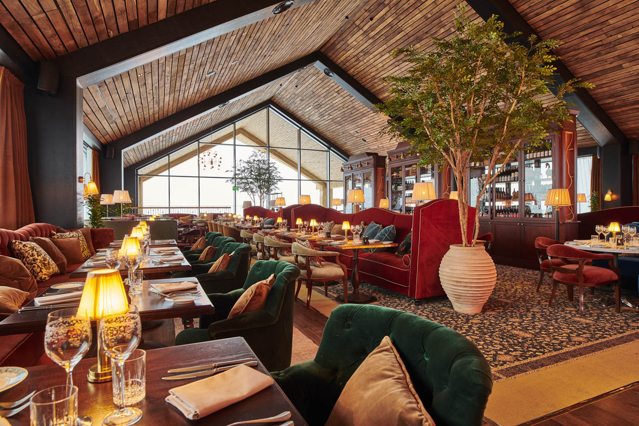 Restaurant Liv dining room with elegant table settings at Fyri Resort