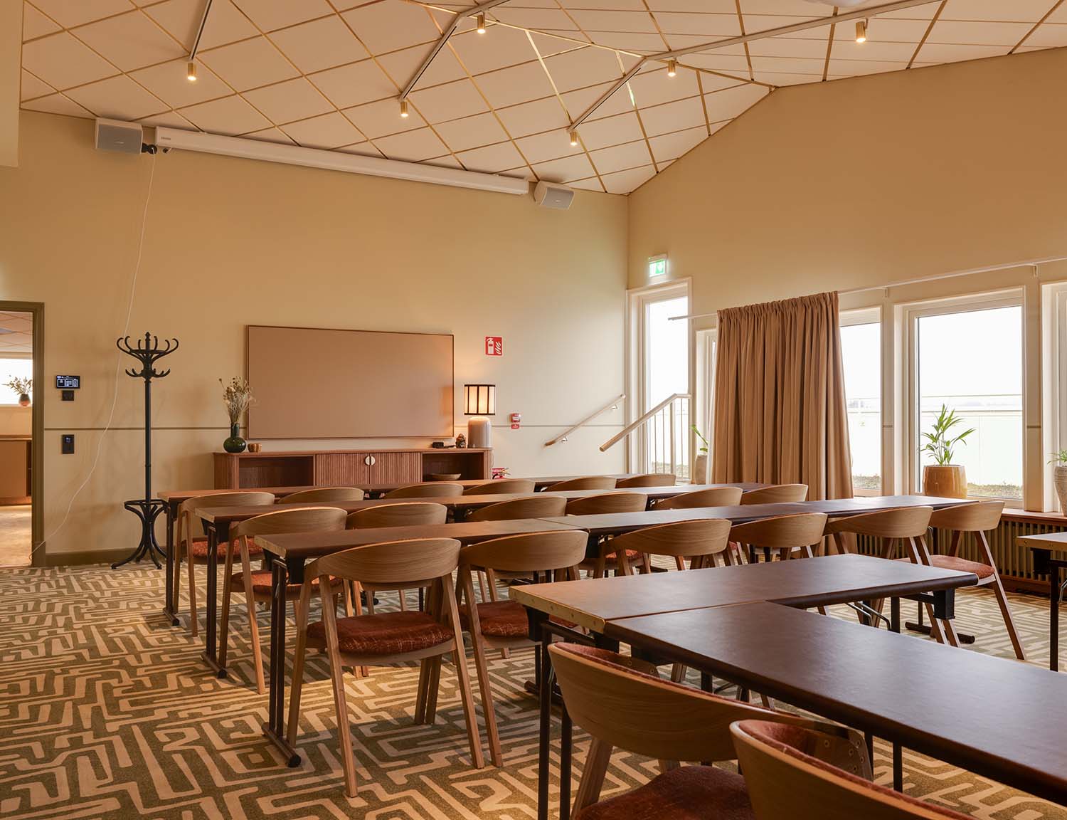 Hjortviken outdoor deck with sunset views over the lake