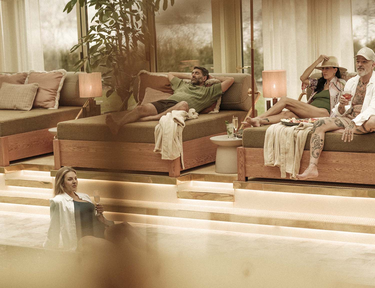 Hjortviken Country Club lounge area with fireplace and seating