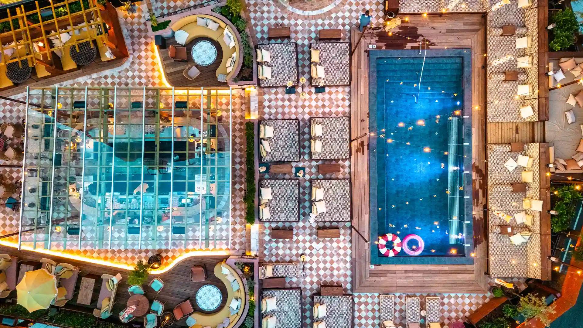 Pam's Pool Deck with sunbeds and heated pool at Jacy'z Gothenburg