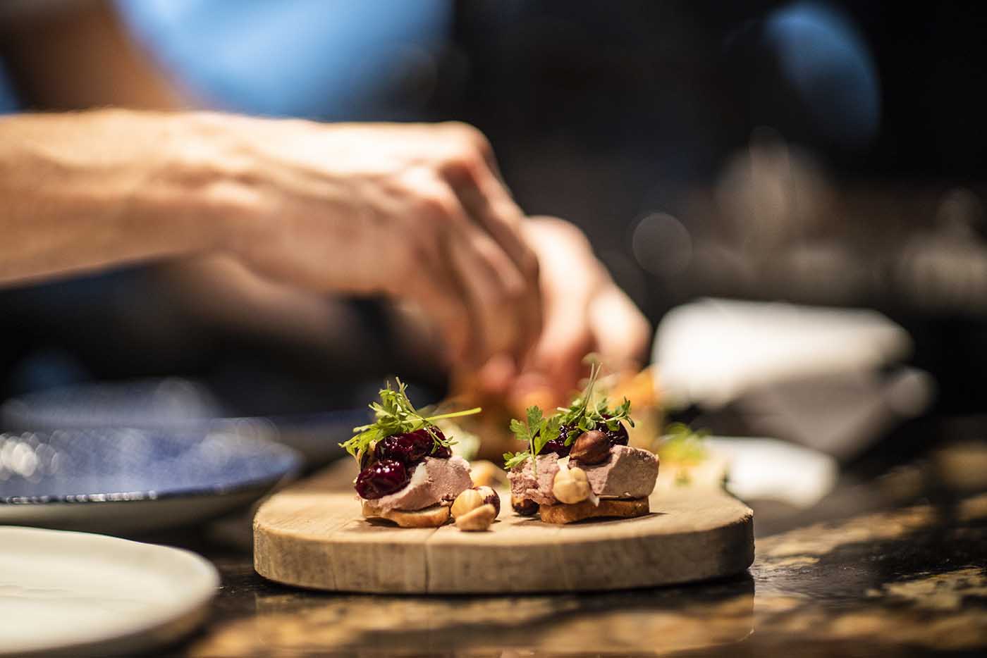 Cozy booth seating at Bar Amuse, Hotel Pigalle