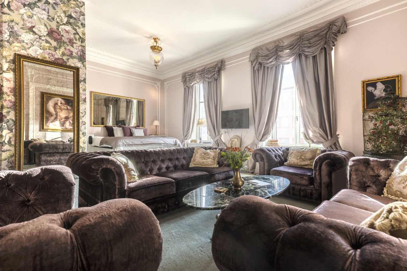 Intimate seating nook with designer lighting at Hotel Pigalle