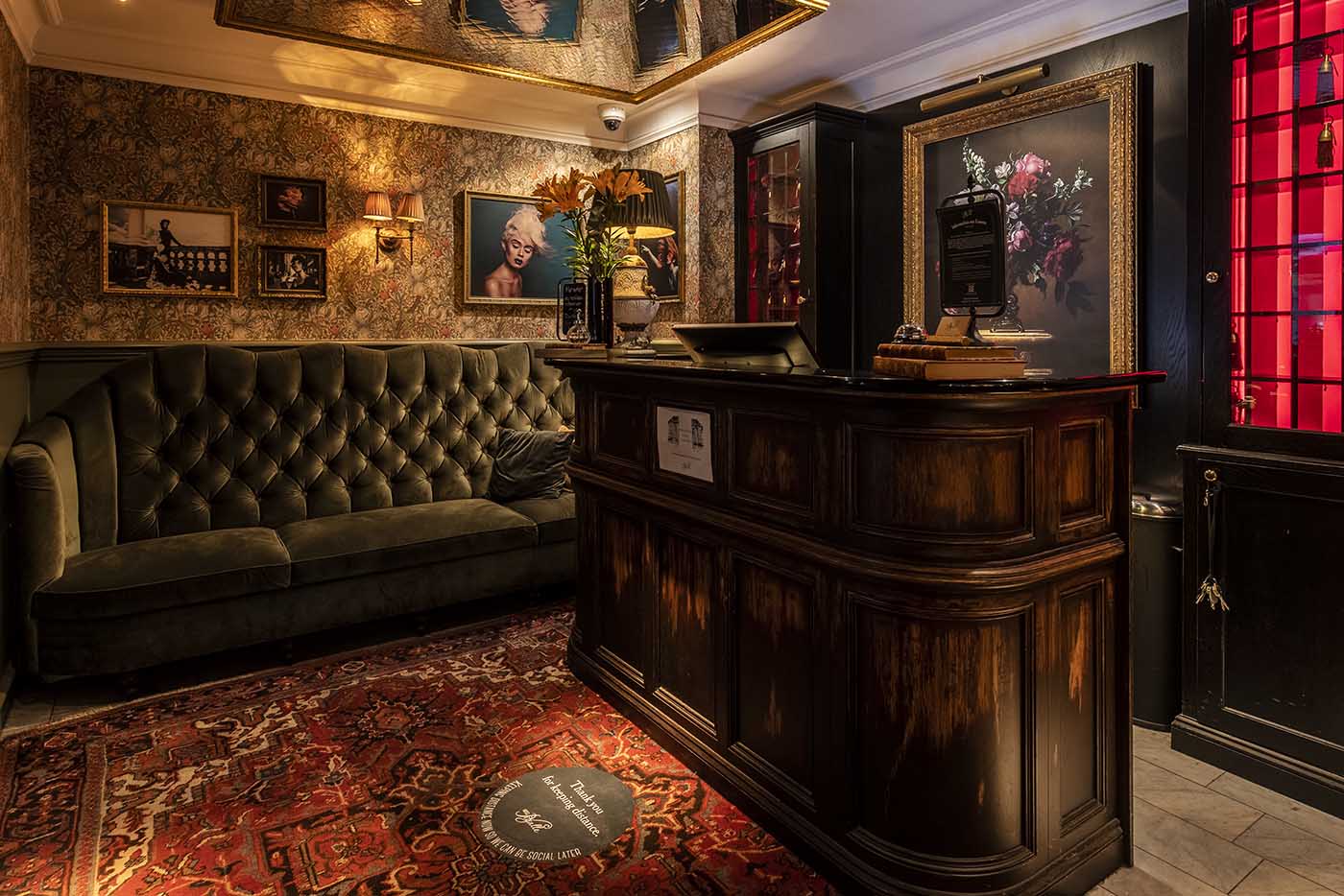 Stylish guest room with warm lighting at Hotel Pigalle Gothenburg