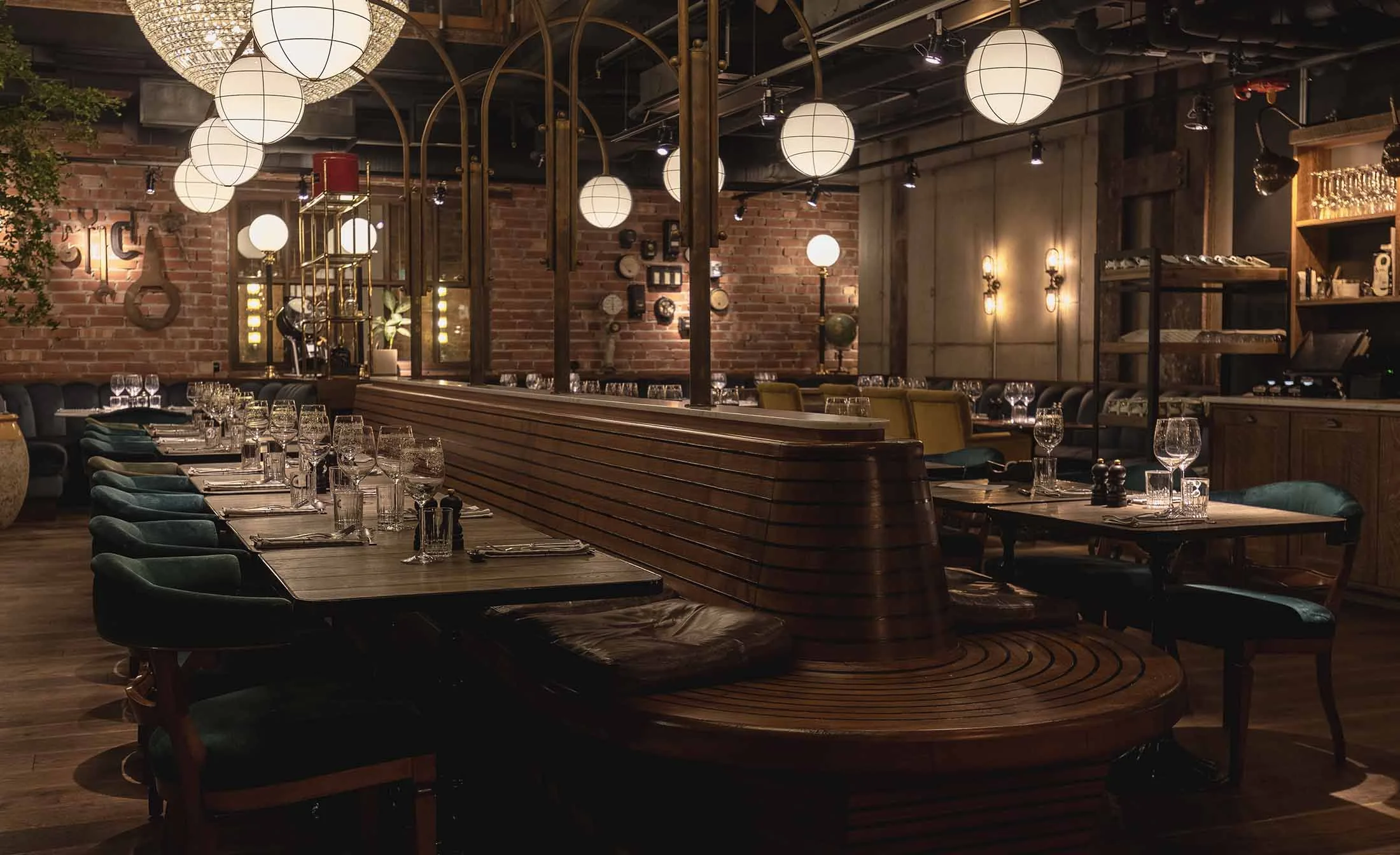 Chamberlin Grill dining room with elegant table setting at The Steam Hotel