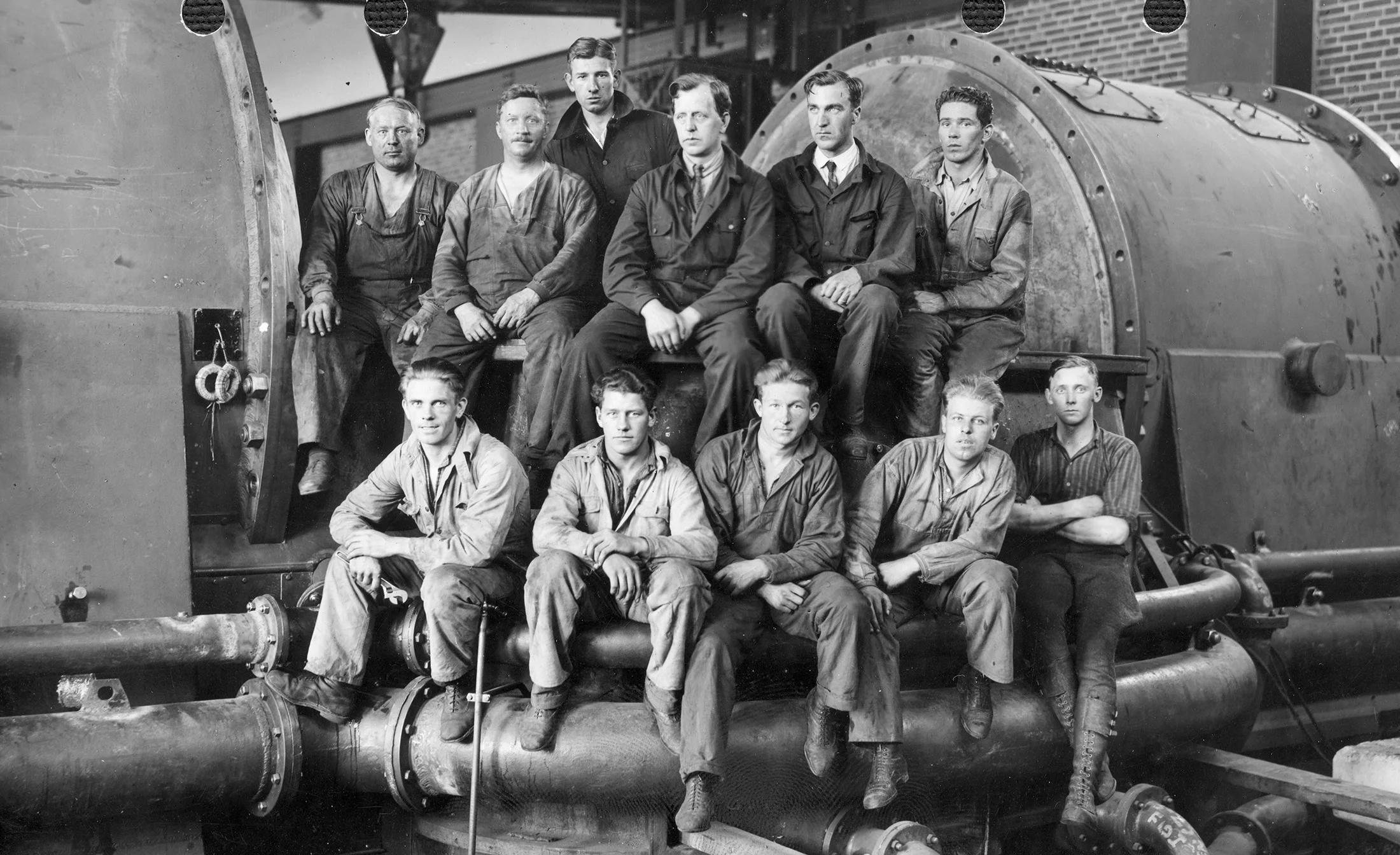 Historic 1950s factory workers at the original Steam Hotel power station