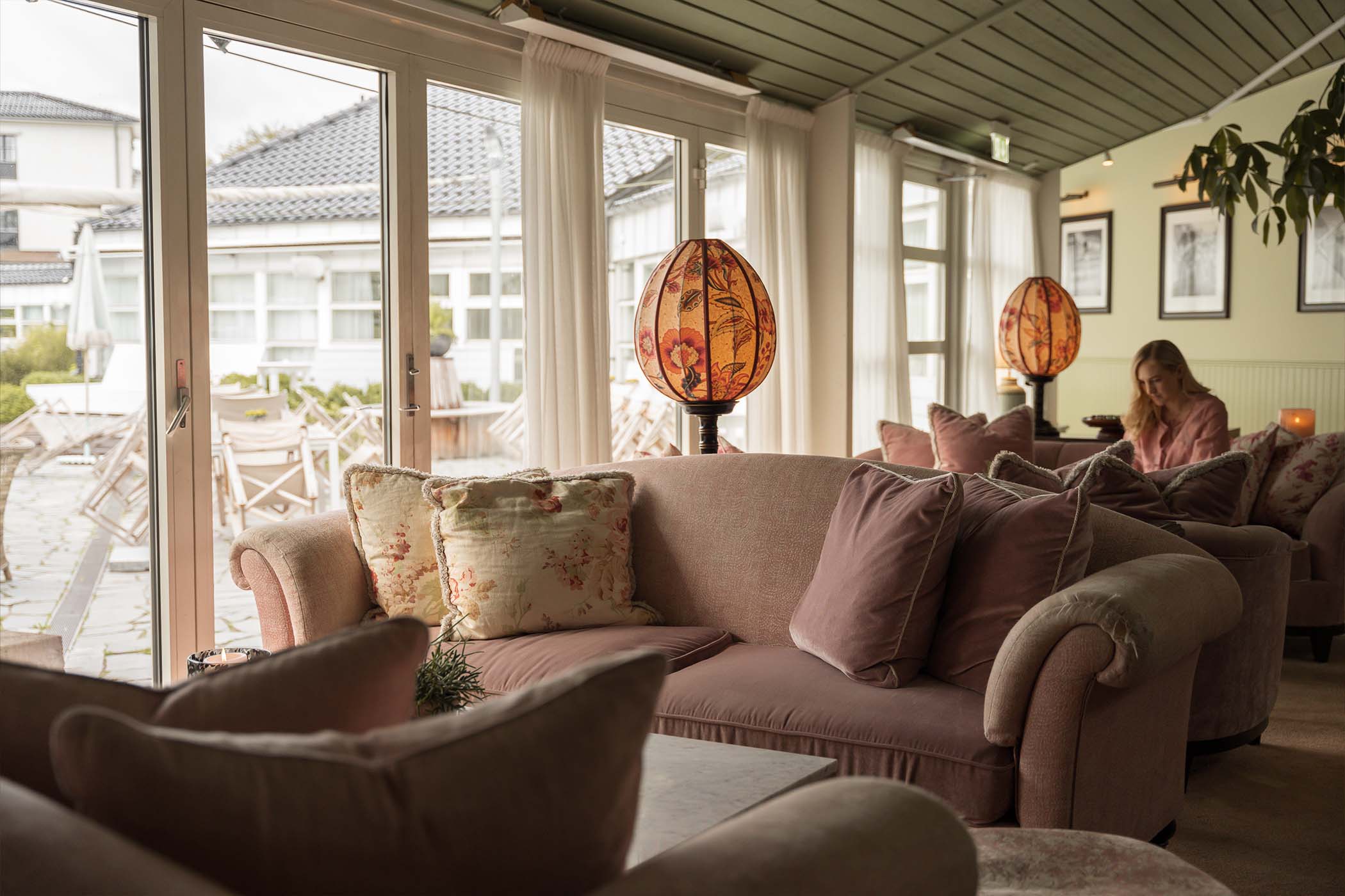 Elegant interior with plush sofas at Ystad Saltsjobad resort