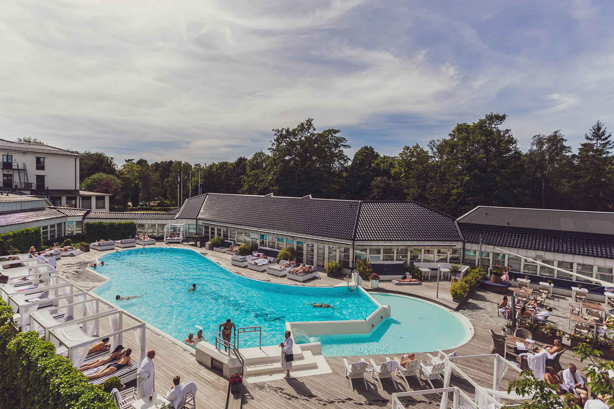 Summer terrace with guests at Ystad Saltsjobad resort